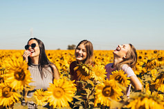 three girls in a field