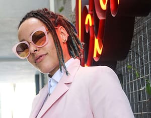 woman in pink suit