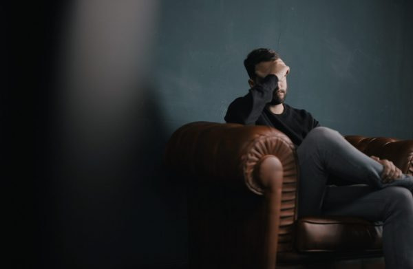 hypnosis for headaches and migraines man with headache
