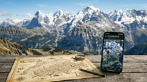 A vintage map and a clear mountain view representing the map vs territory concept