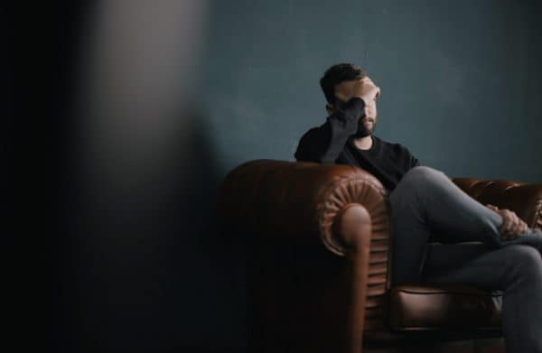 hypnosis for headaches and migraines man with headache